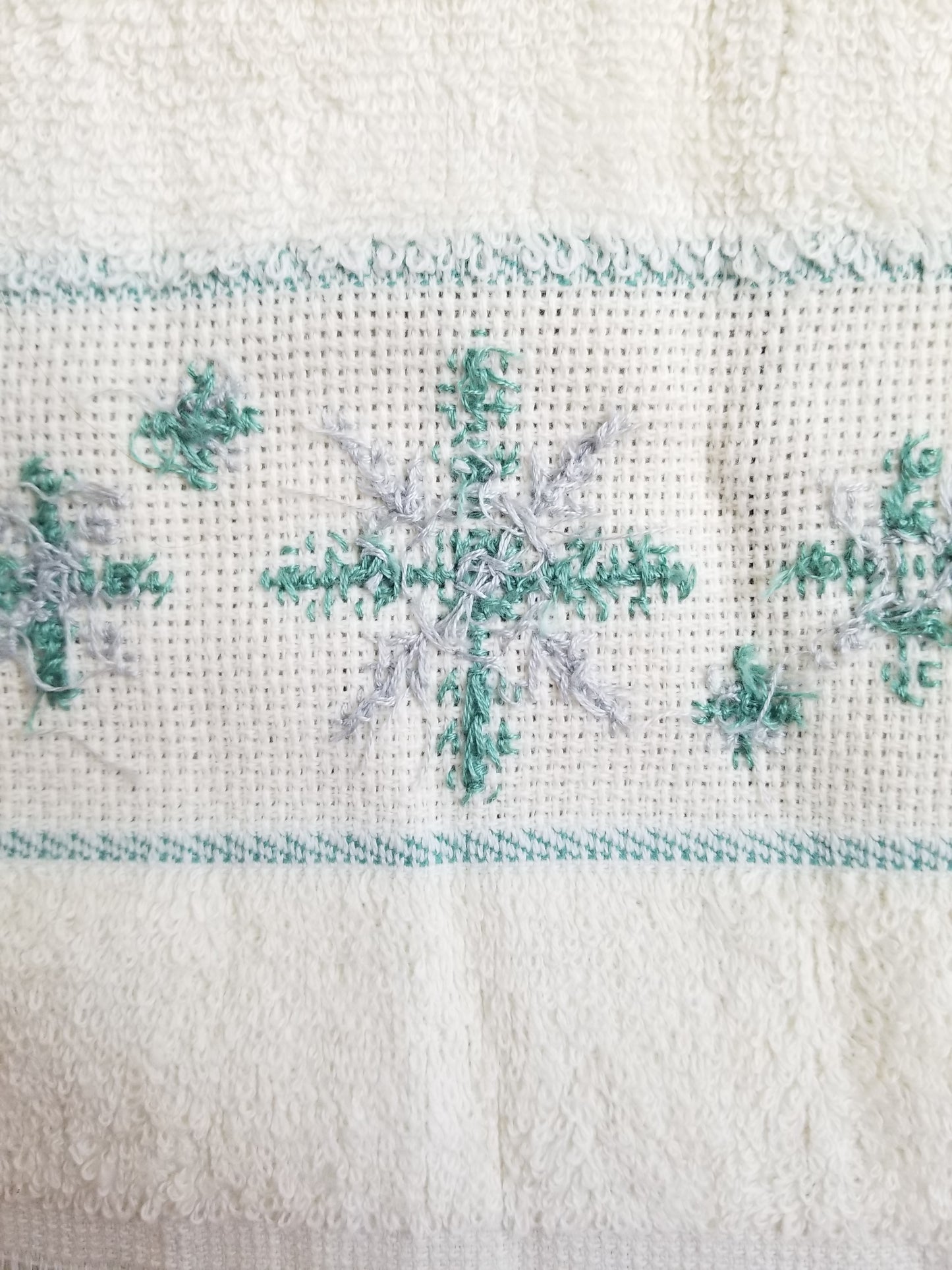 Vintage ross Stitch and sewing pattern Grab Bag Finished Cross Stitch Towel and plastic embroidery hoop