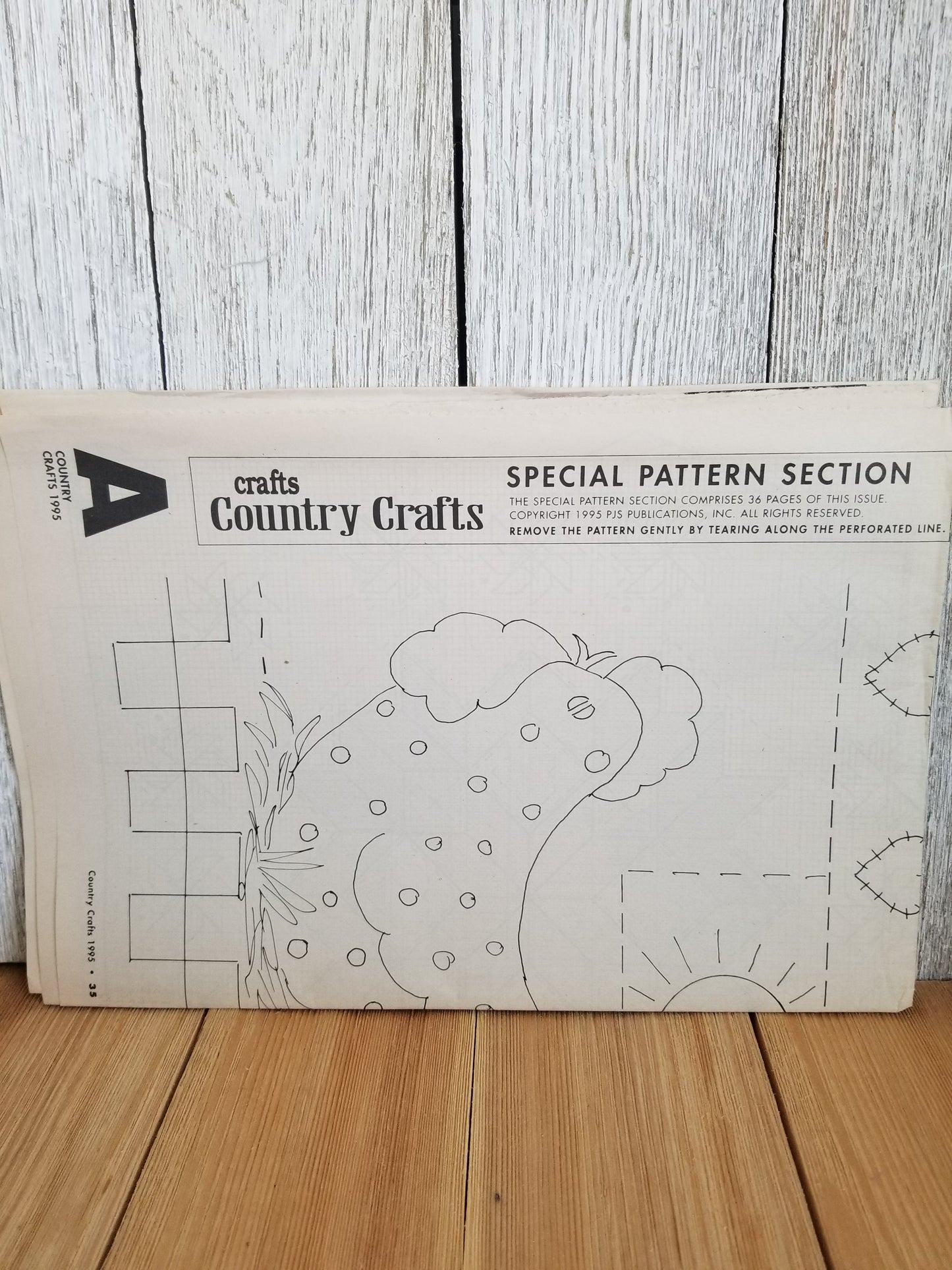 Vintage ross Stitch and sewing pattern Grab Bag Finished Cross Stitch Towel and plastic embroidery hoop