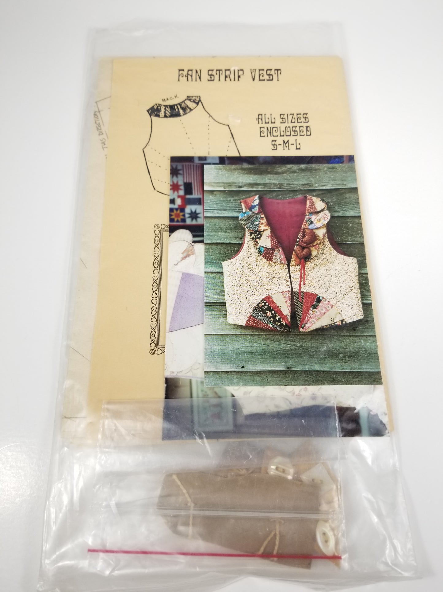 Fan Strip Vest Osage County Quilt Factory with buttons and shells sewing pattern