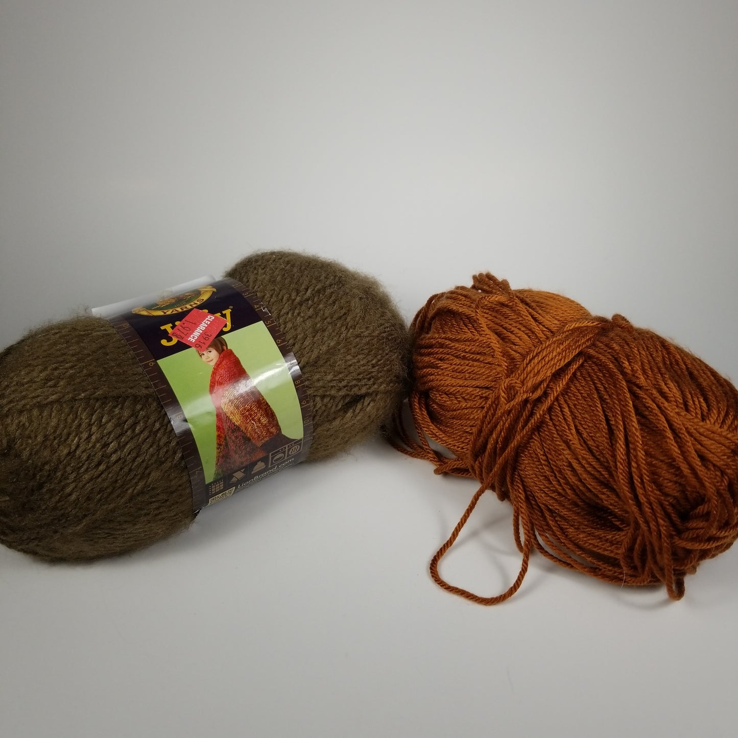 Brown yarn bundle lion brand caffe and mystery brand