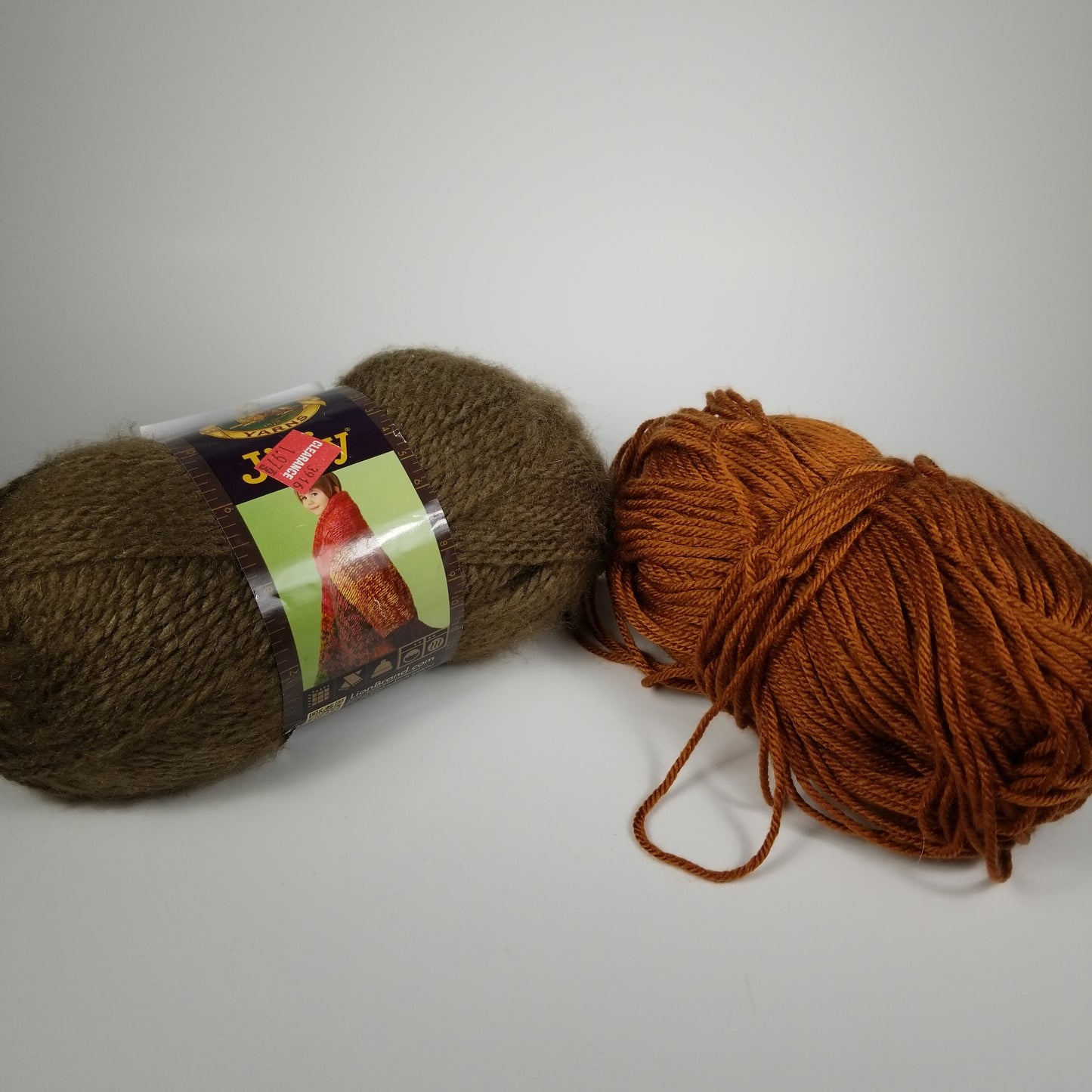 Brown yarn bundle lion brand caffe and mystery brand