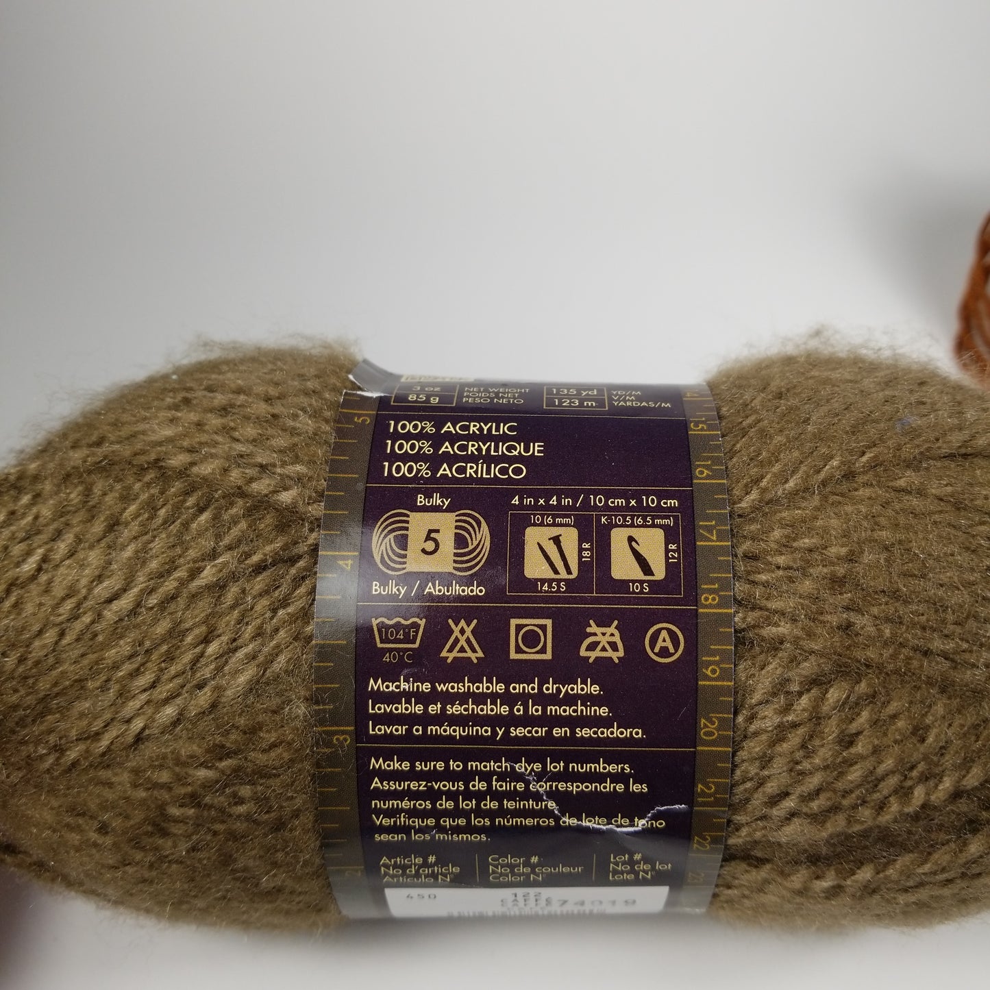 Brown yarn bundle lion brand caffe and mystery brand