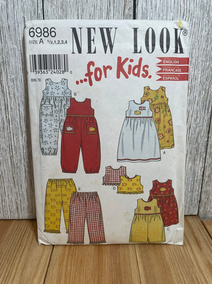 New Look 6986 For Kids Summer Romper, Dress, Stretch Pants, and Tank Top Pattern Size 1/2-4 UNCUT FF
