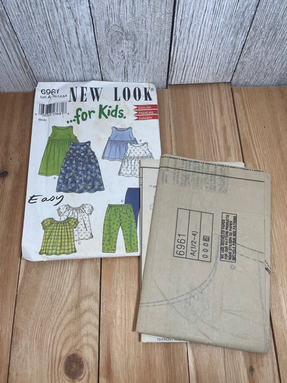 New Look 6961 For Kids Summer Dress in Two Lengths Ruffle Neck Shirt and Stretch Pants Pattern Size 1/2-4 UNCUT FF