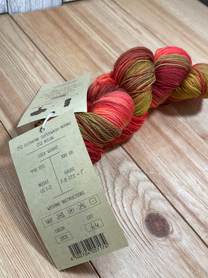 DISCONTINUED Urth Yarns Merino Sock Red and Gold 2031 Hand Painted Fingering Weight Wool Yarn Full Skein