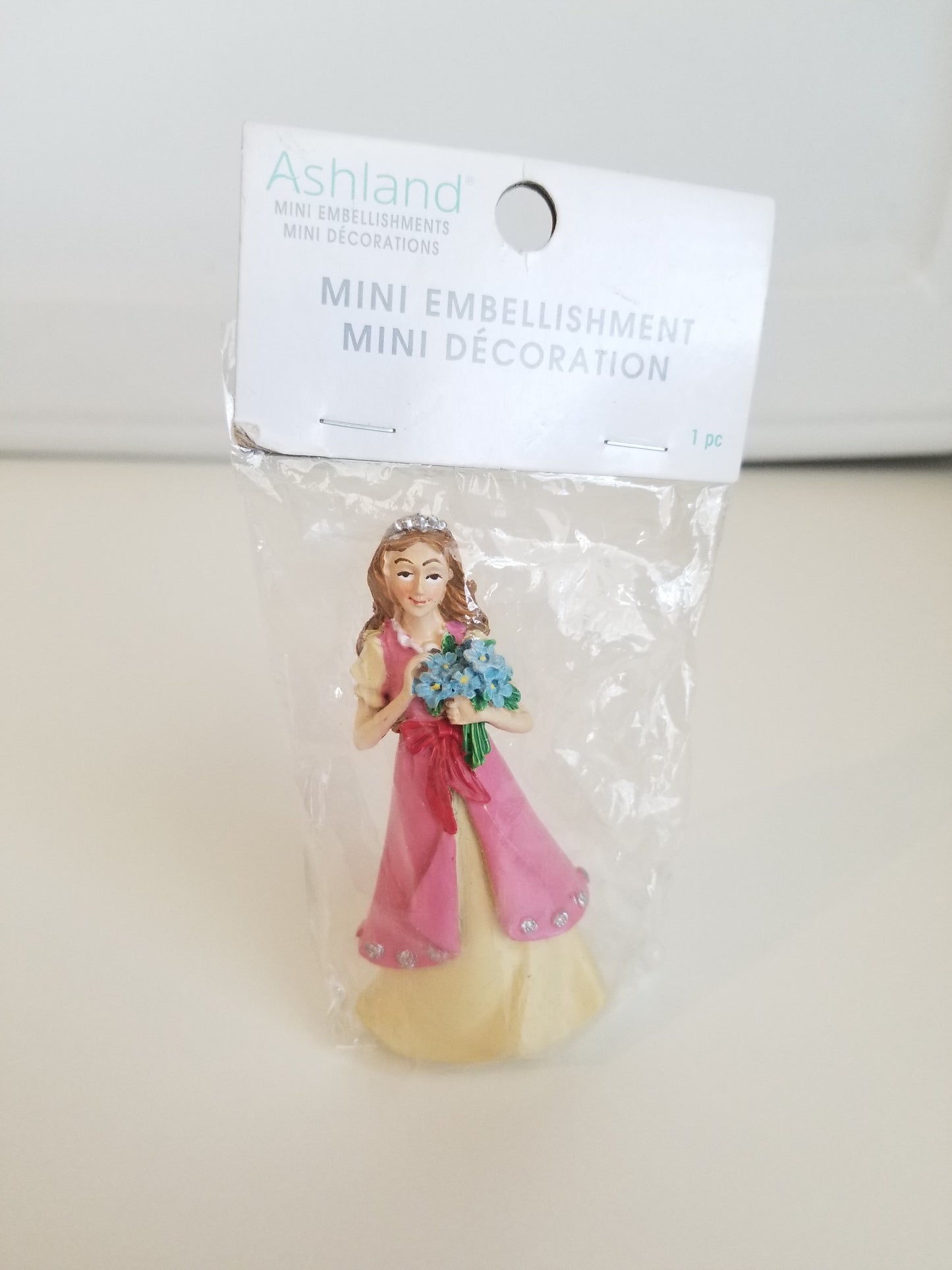 Mini embellishment lady holding flowers flower girl doll house miniature