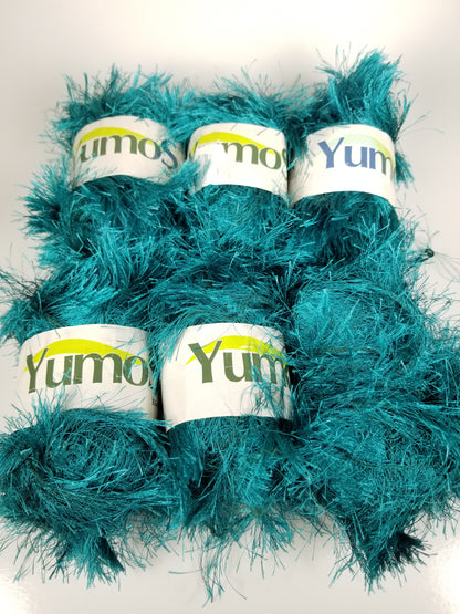 Yumos eyelash yarn color 33-110 lot 88. 8 skein bundle