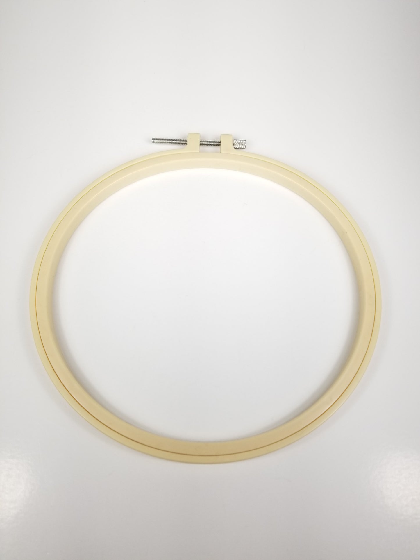 Plastic embroidery hoop in buff tan