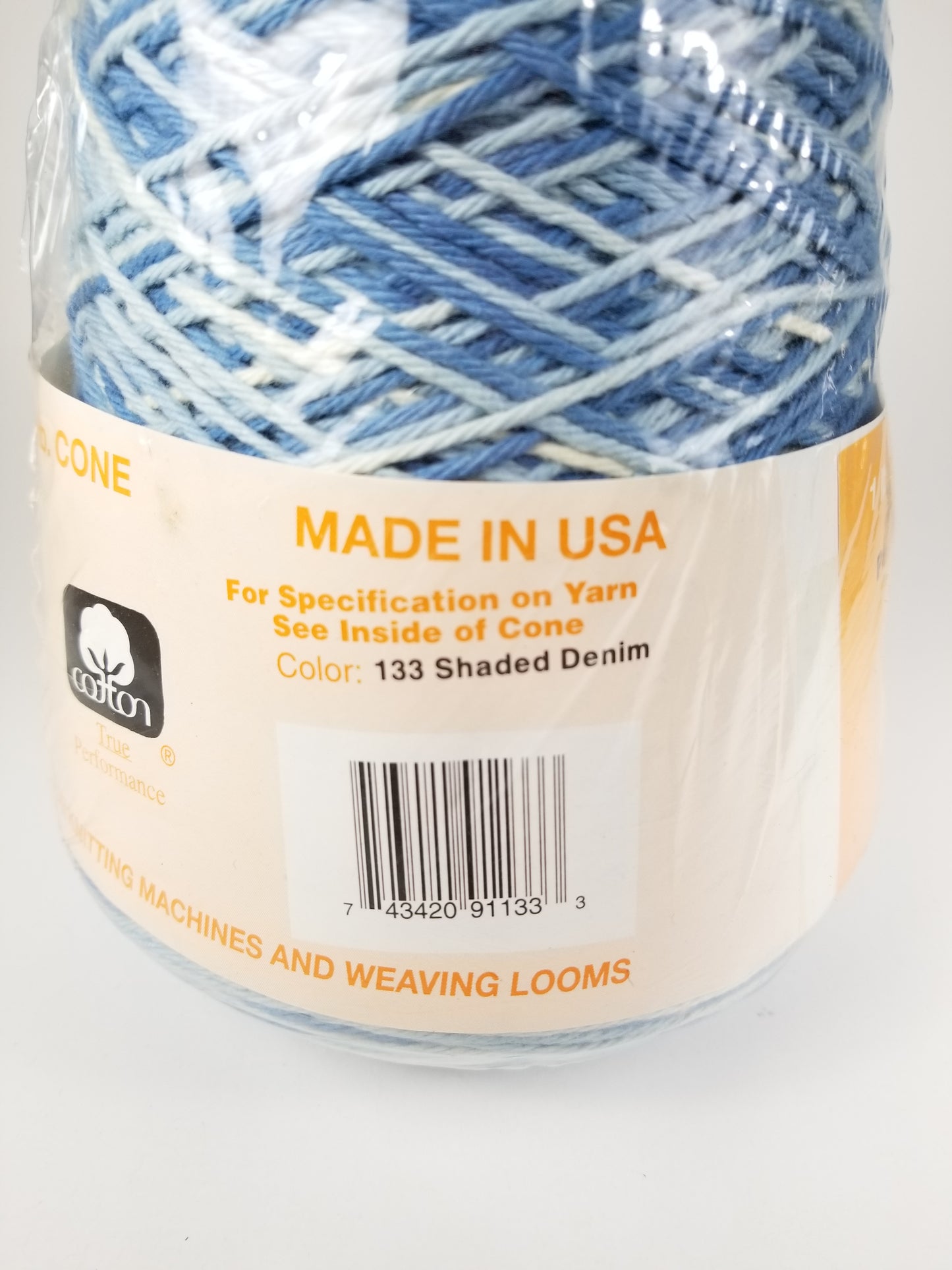 Vintaged wrapped Peaches and Cream Cotton Yarn Cone 133 Shaded Denim 1 lb cone