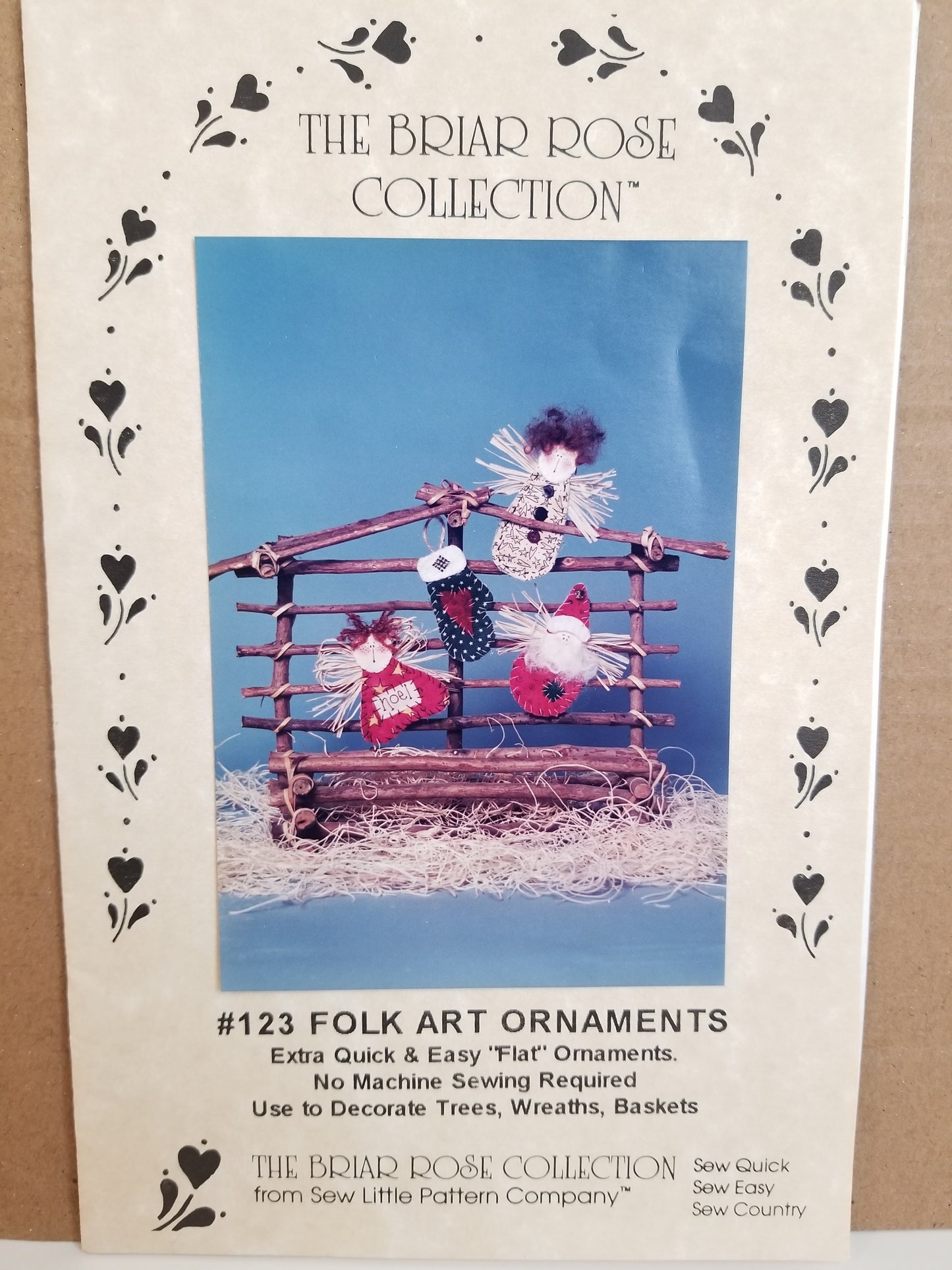 The Briar Rose Colllection #123 Folk Art Ornaments angle, santa claus, and christmas stocking Pattern