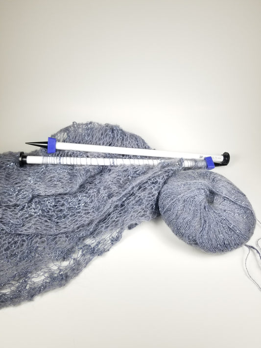 Abandoned Project Mohair Shawl And Giant Knitting Needles