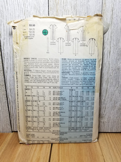 Butterick 6682 1980s Misses' Dress. Loose-fitting, A-line dress, below mid-knee or below mid-calf Uncut FF
